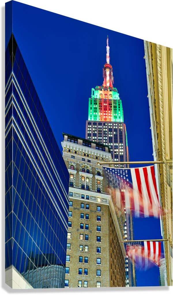 Empire State Building shines above Manhattan at dusk in New York