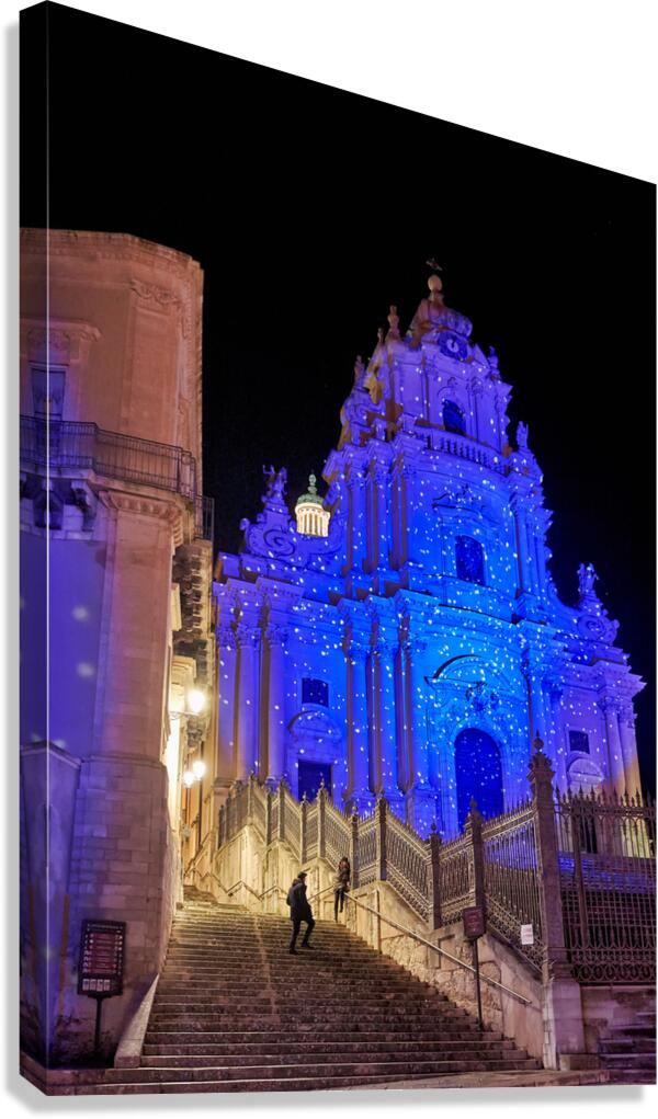 Duomo of San Giorgio lit during nighttime in Modica Sicily