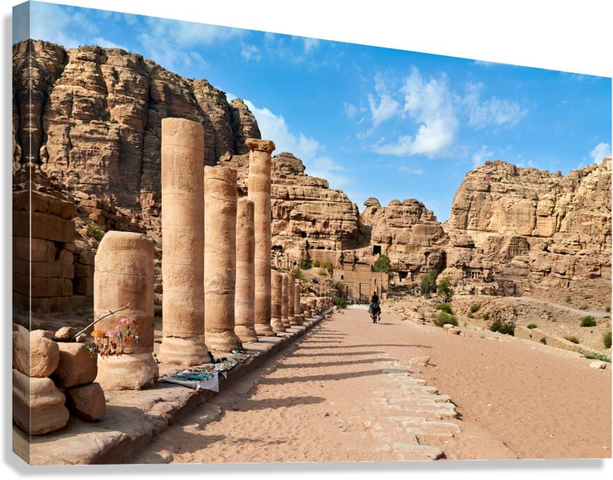 Exploration of Hadrian Gate at Petra archaeological site in Jord