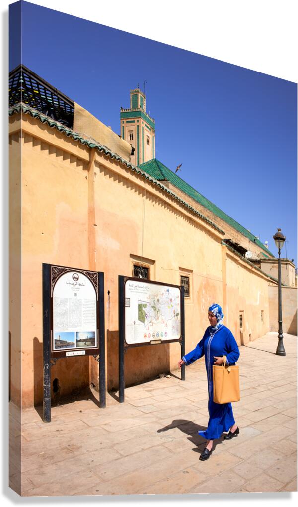 Woman walks in the Medina of Fez Morocco during daytime