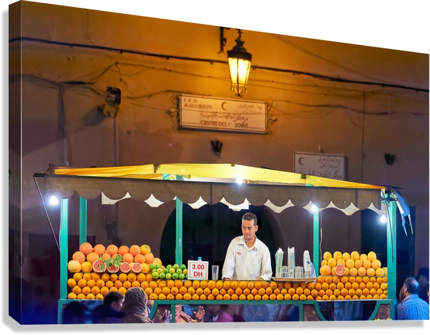 Orange juice stall in Marrakesh with fresh fruits at night
