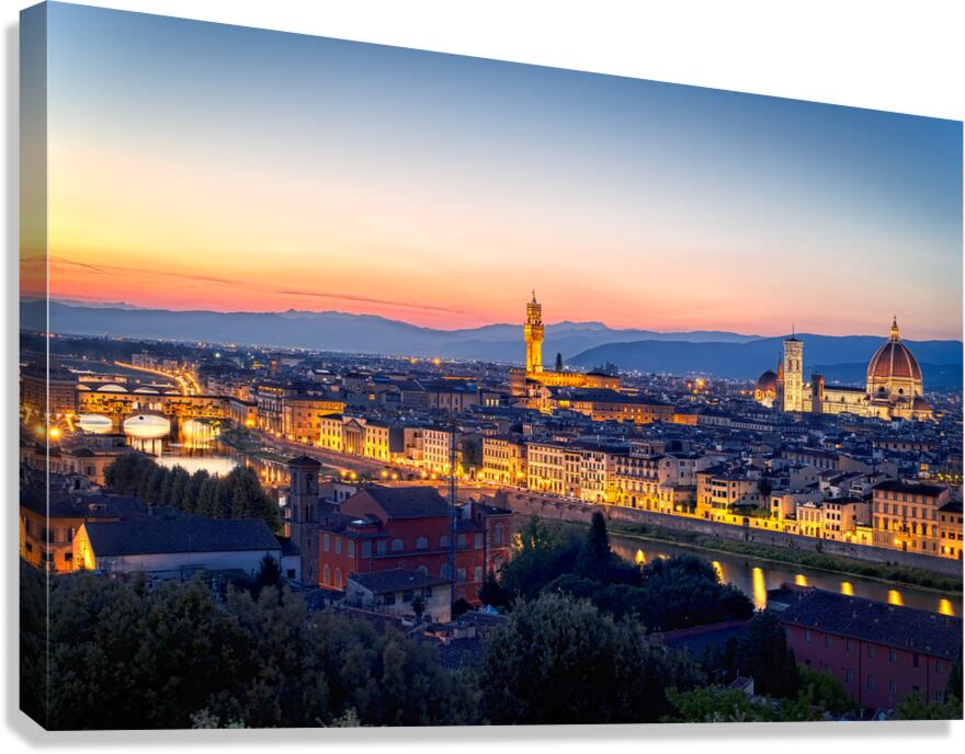 High view of Florence at dusk with city lights and landmarks