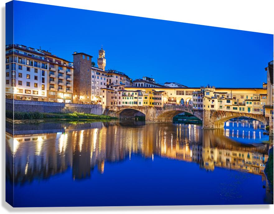 Florence Tuscany Italy view of Ponte Vecchio at sunset over Arno