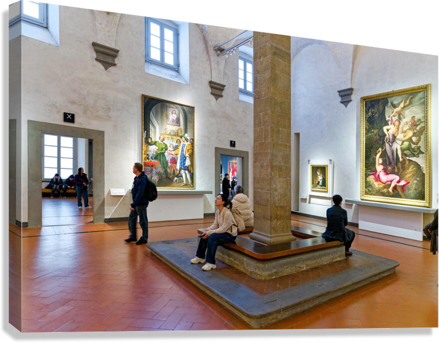 Large art gallery in Florence with visitors exploring the exhibi