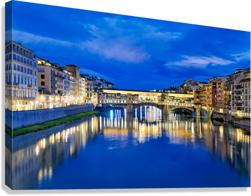 Ponte Vecchio bridge over the Arno river in Florence at night