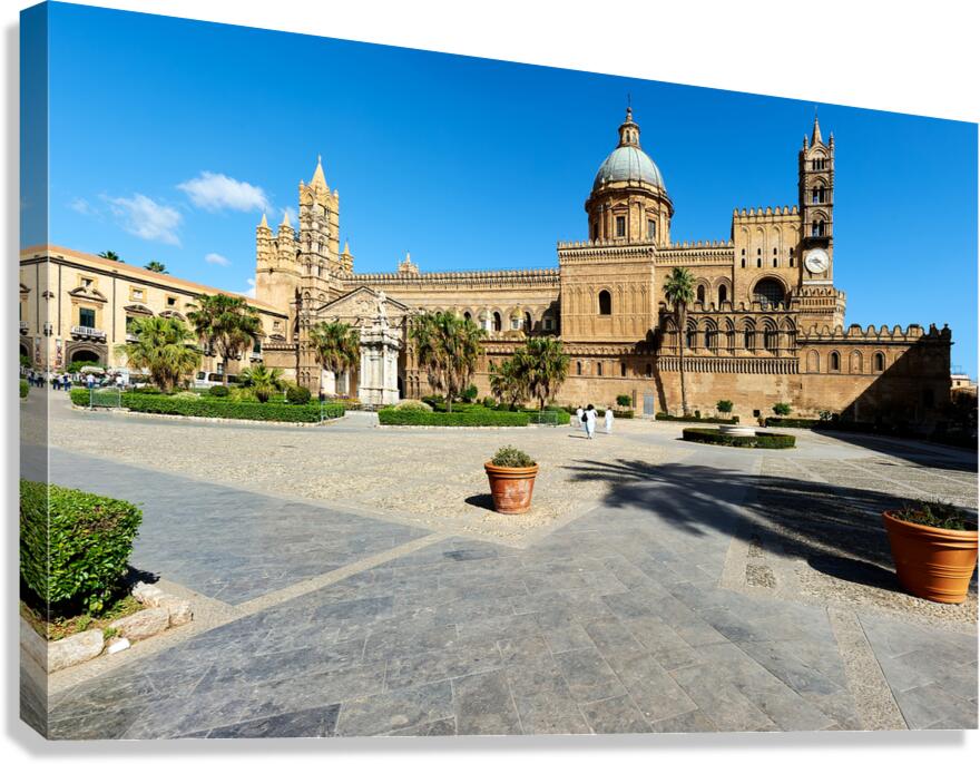 Palermo Cathedral stands tall in Sicily under clear blue sky