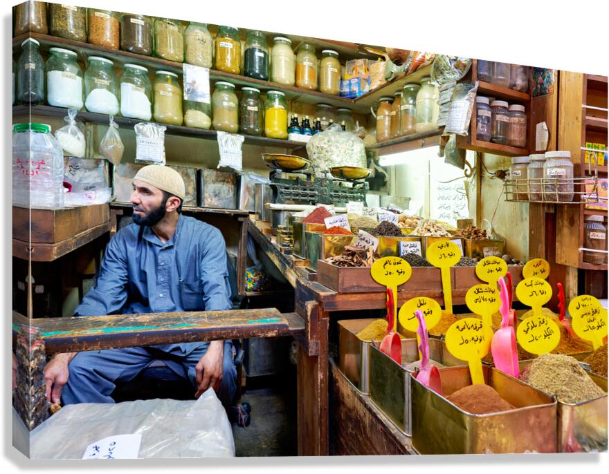 Market scene in Al Hamidiyah Souq showing spices and vendor in S