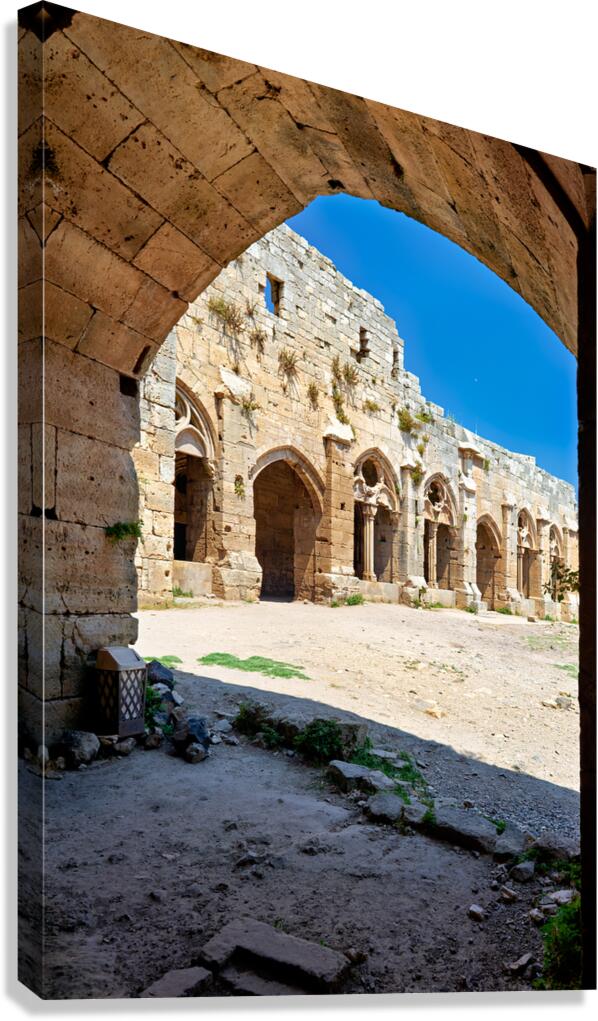 Visit Krak des Chevaliers castle in Syria during bright daylight