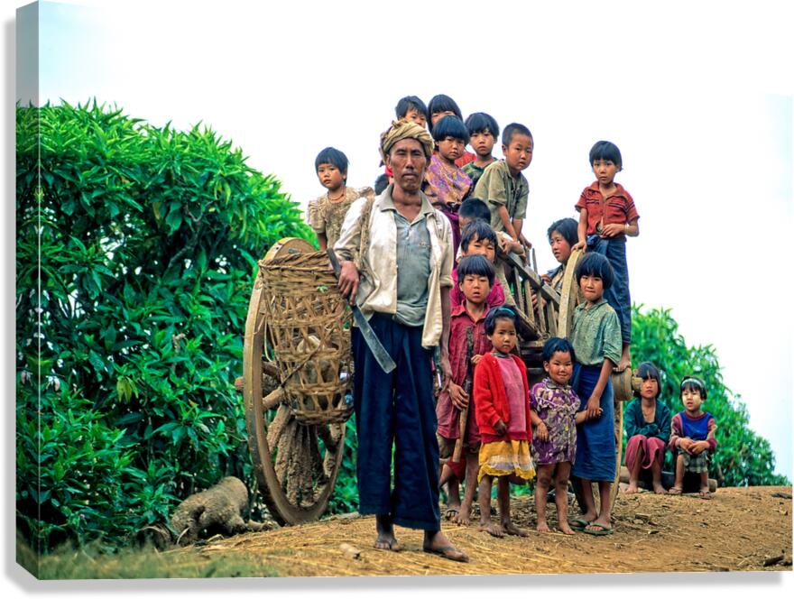 Children and adults gather in Kalaw village in Myanmar