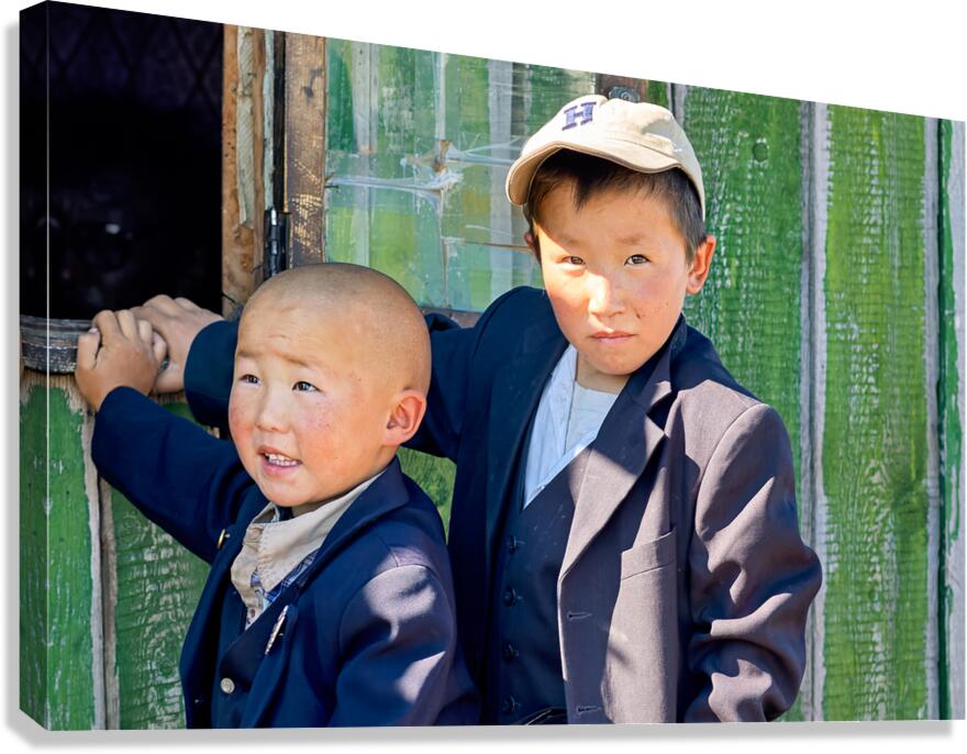 Children in Mongolia standing by a green wooden door