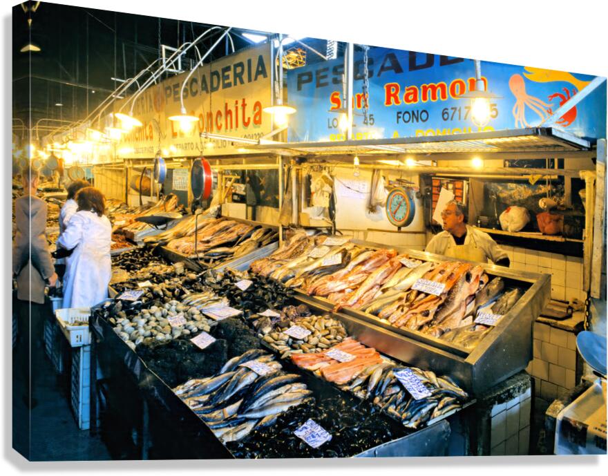 Bustling fish market with fresh seafood and vendors.