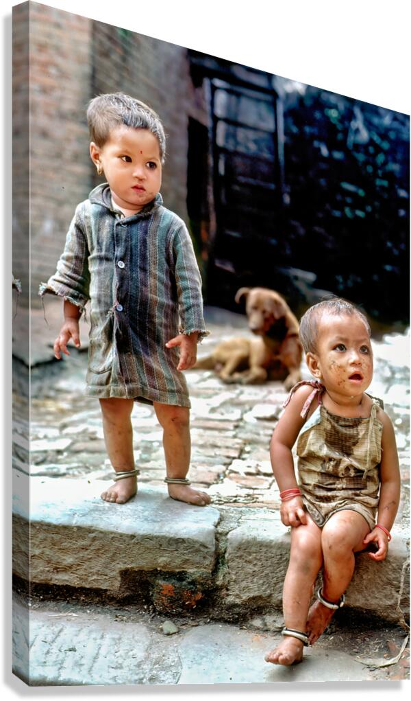 Children playing in a narrow street in Kathmandu Nepal during d