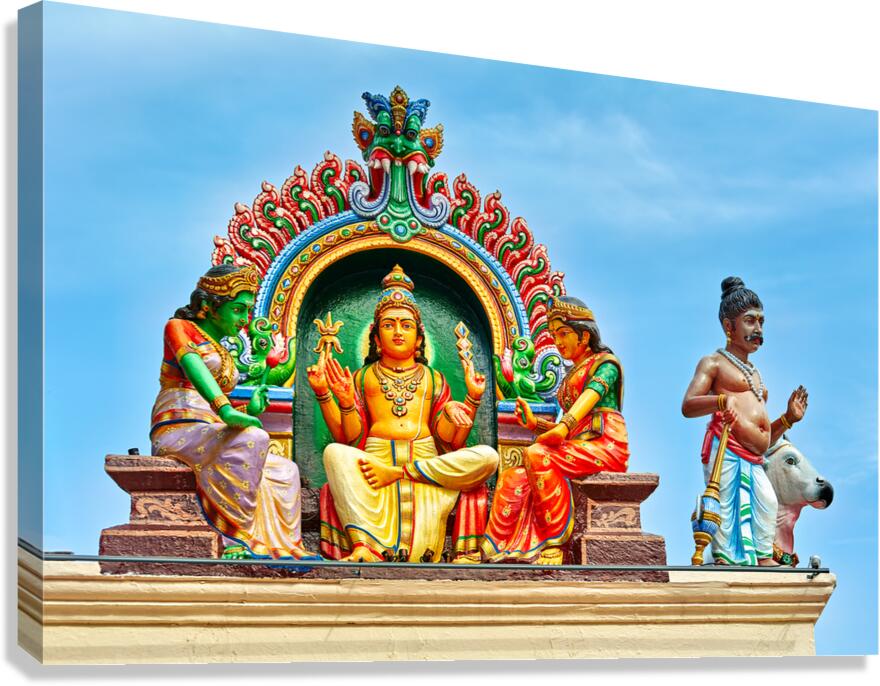 Visitors admire sculptures at Sri Mariamman Temple in Singapore