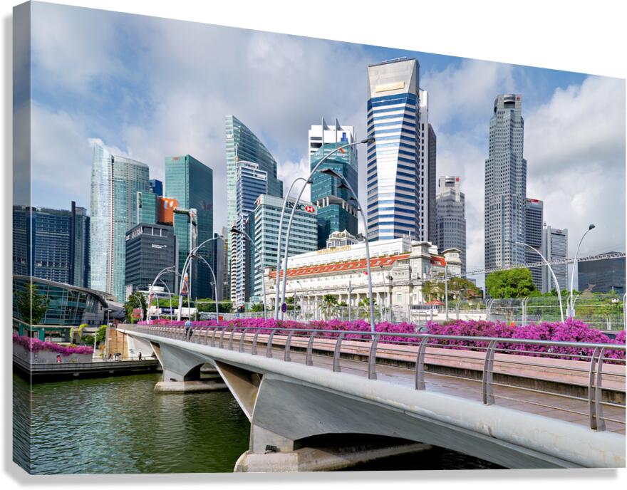 People are walking by a bridge in Singapores financial area