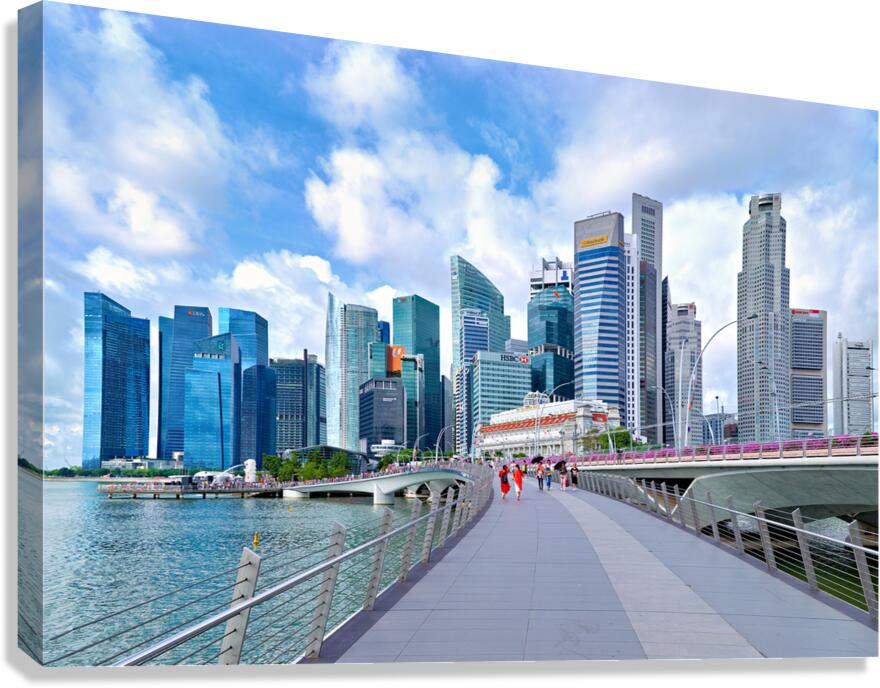People stroll in Singapores financial district by a bridge