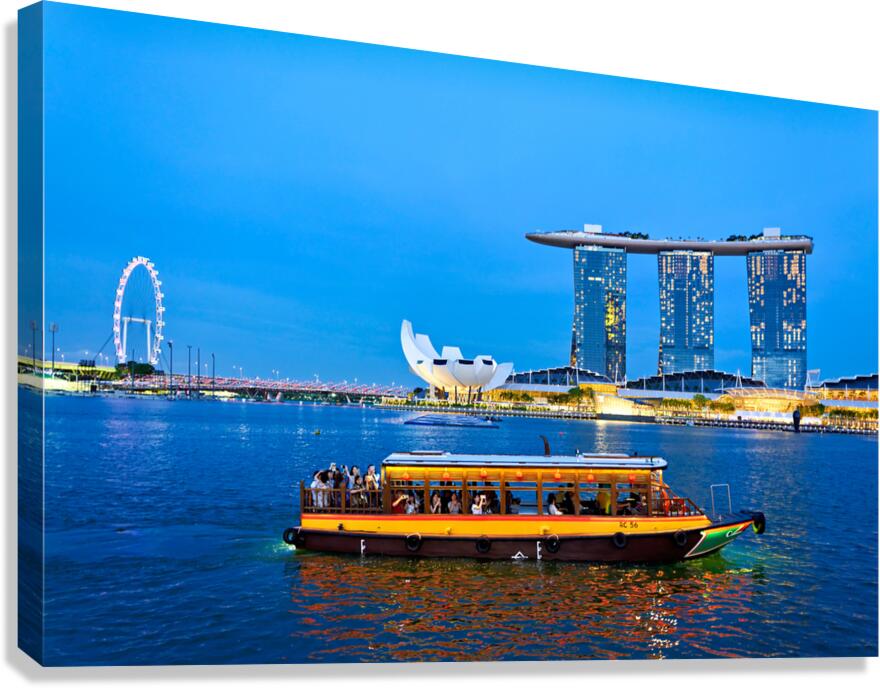 Sunset boat rides past Merlion and Marina Bay Sands