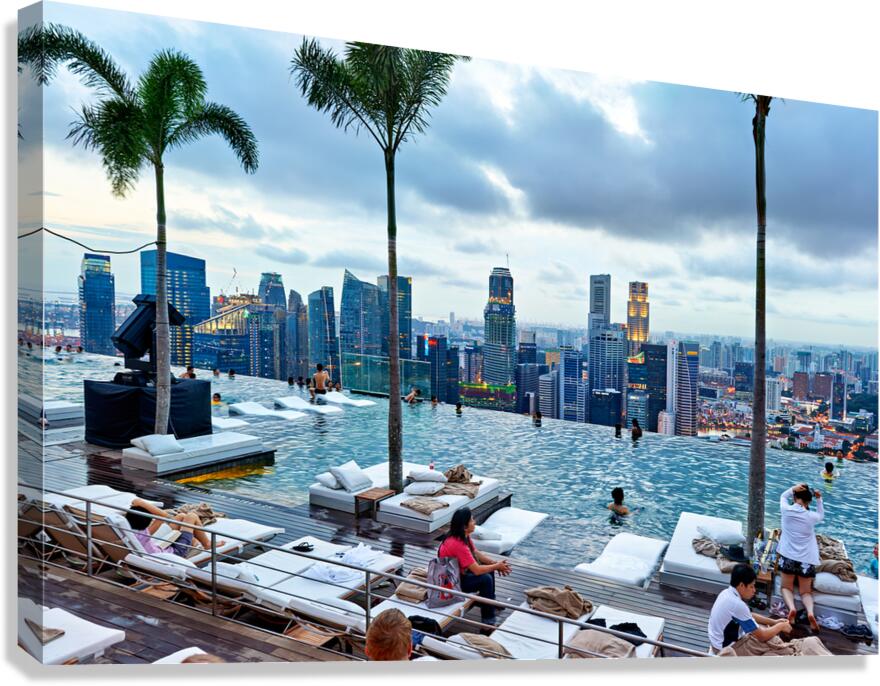 Visitors relax and swim in Marina Bay Sands Infinity Pool