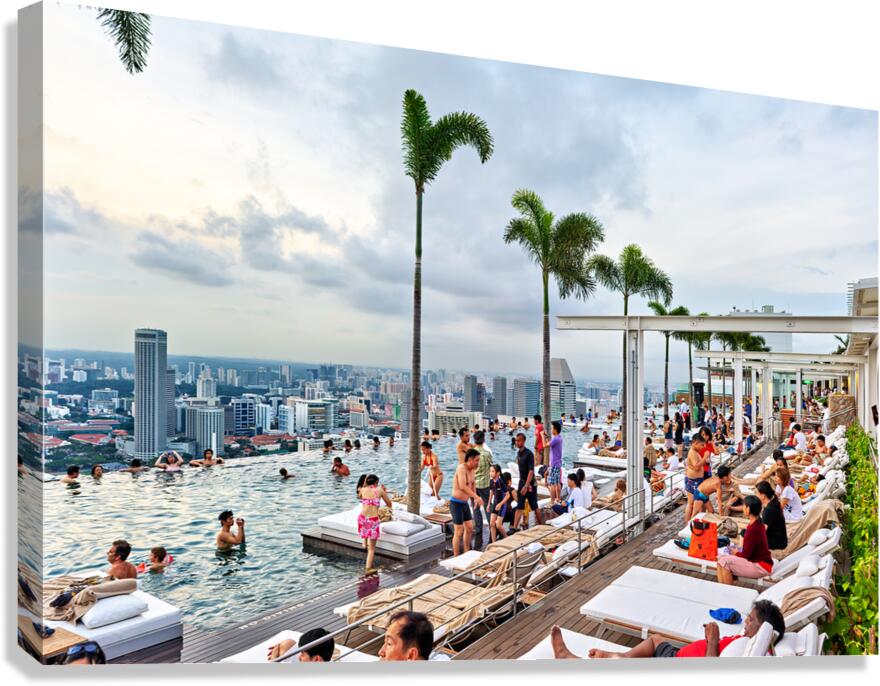Visitors enjoy swimming in the infinity pool at Marina Bay Sands