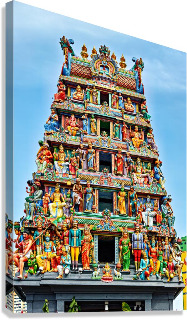 Visitors admire sculptures at Sri Mariamman Temple in Singapore