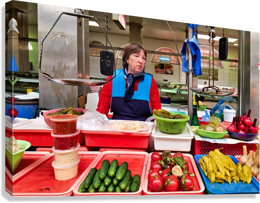 Vendor sells fresh produce at Kuznechnyy Rynok St. Pete