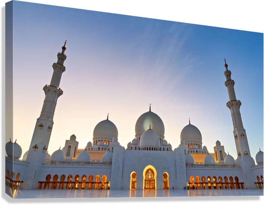 Illuminated Sheikh Zayed Grand Mosque during dusk in Abu Dhabi