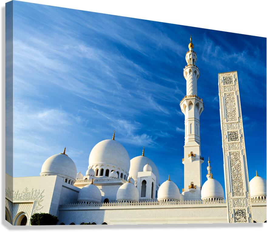 Grand mosque in Abu Dhabi with tall minarets and domes