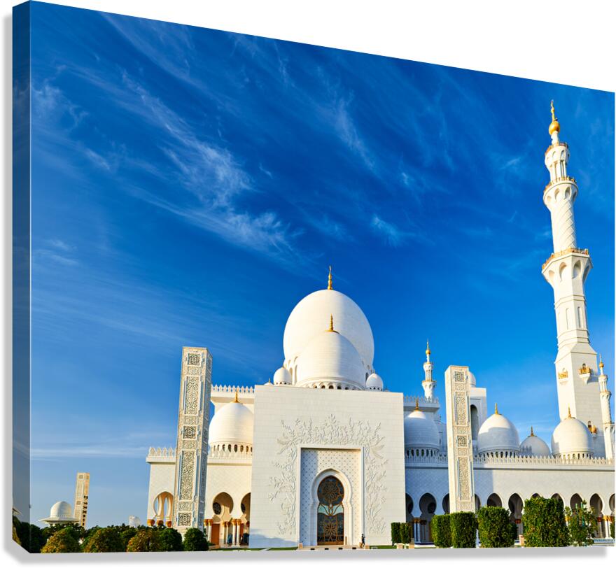 Abu Dhabi mosque stands tall under blue sky