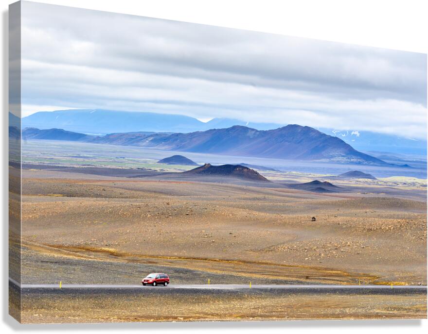 Car driving along Hringvegur road in Iceland landscape