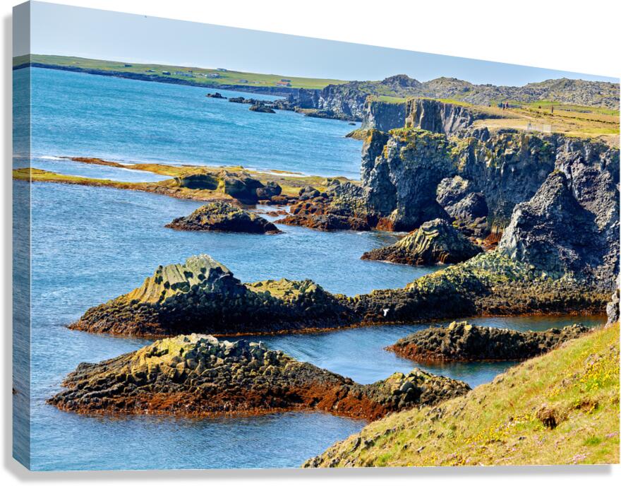 Exploring Arnarstapi cliffs in Iceland by the ocean