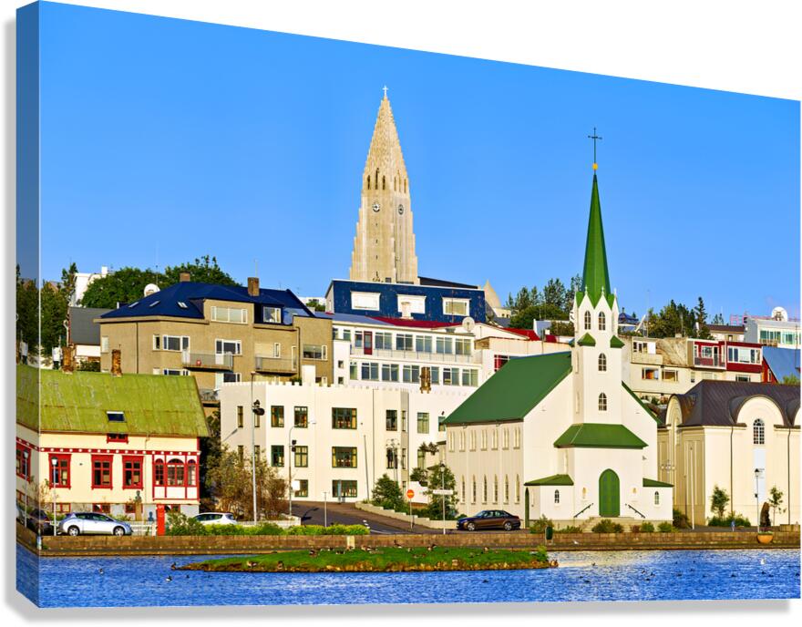 Lutheran free church and Halgrimskirkja near Tjornin lake