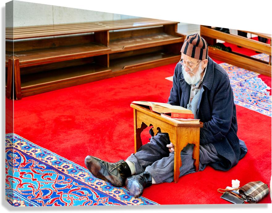 Prayer time inside Fatih Mosque in Istanbul Turkey