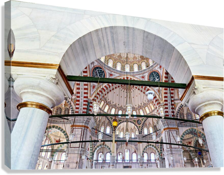 Visitors observe the interior of Fatih Mosque in Istanbul