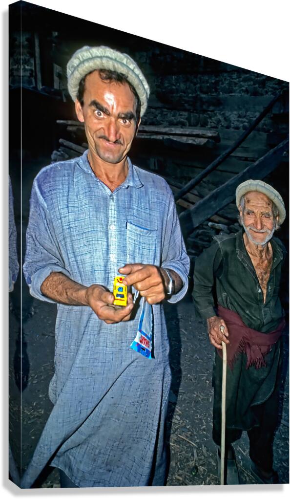 Men show toy in Kalash Village during evening hours