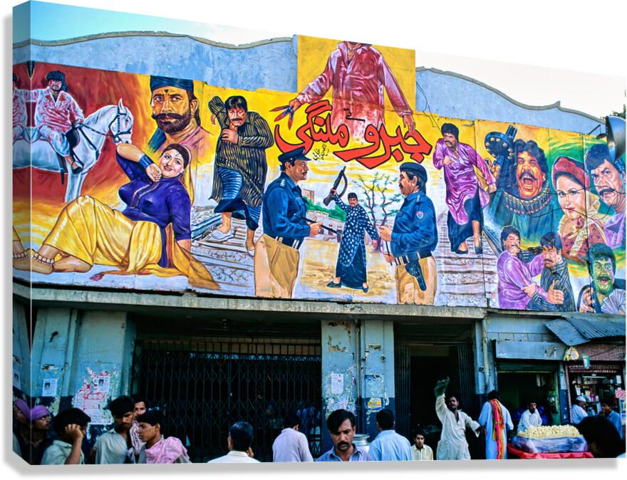 Wall art outside cinema in Lahore showing local culture and life