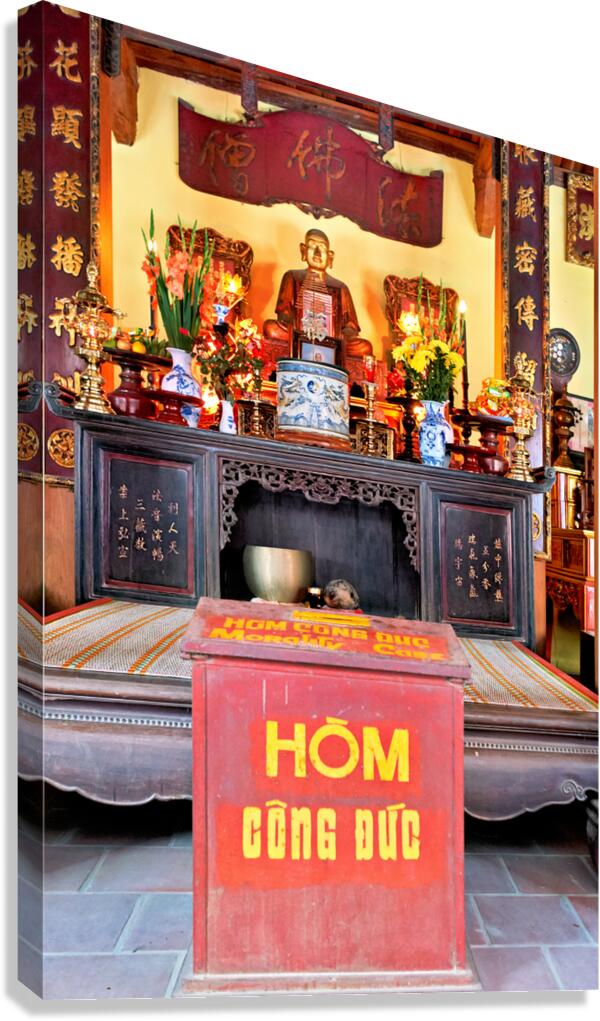 Hanoi temple with offering table and altar space for worshipers