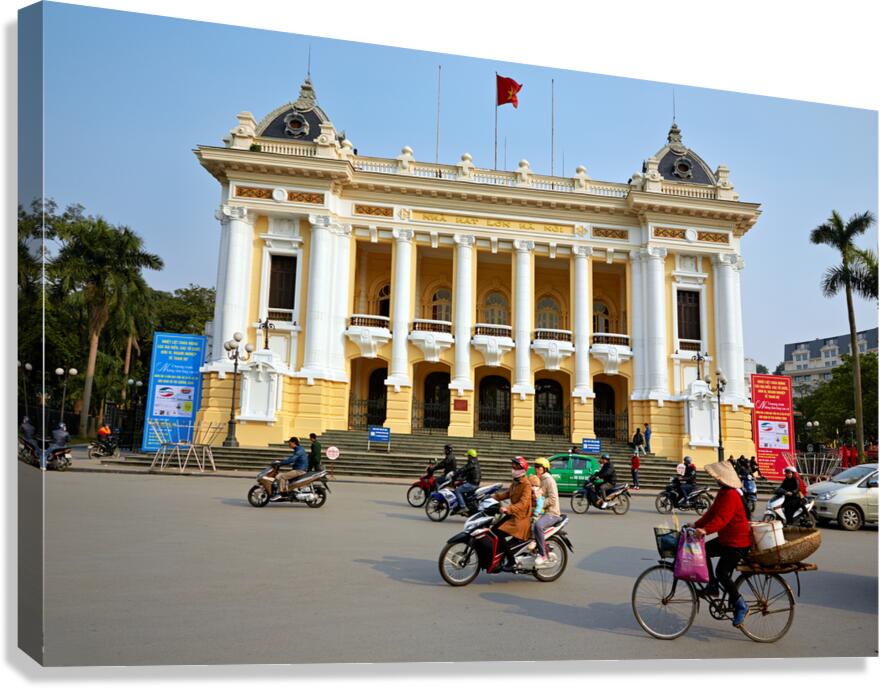 Motorcycles and bicycles near Hanoi Opera House during daytime
