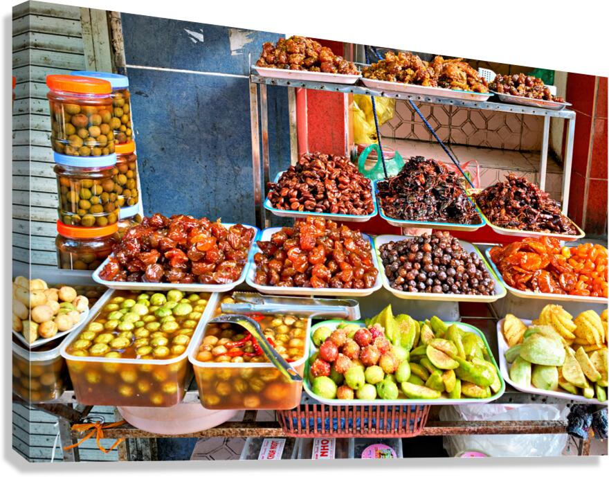 Fruit and snack stall in Hanoi Vietnam during the day