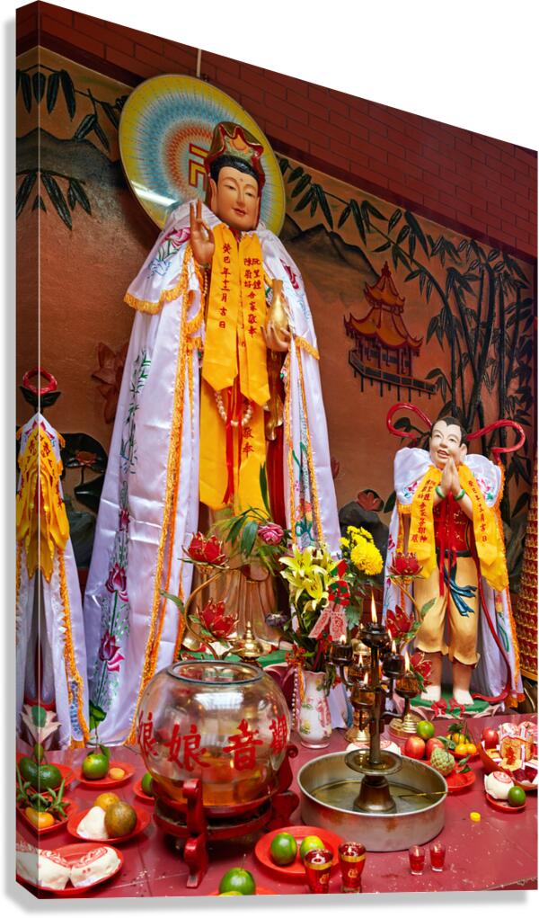 Offerings and prayers at a temple in Ho Chi Minh City
