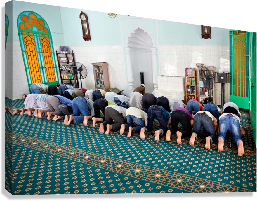 Men praying in a mosque in Ho Chi Minh City Vietnam