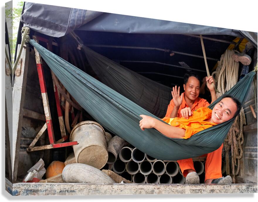 Workers relax in a truck in Ho Chi Minh City Vietnam