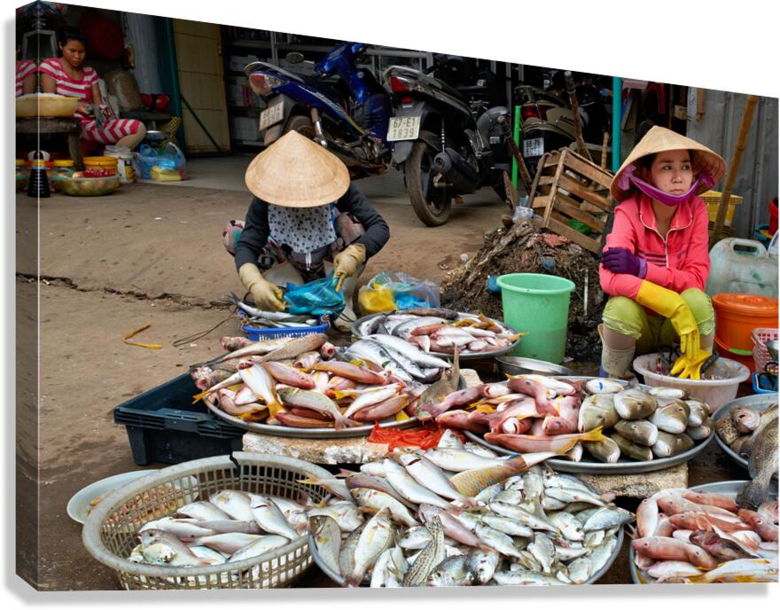 Fish market in Phu Quoc with local vendors working