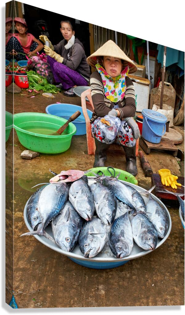 Fishing woman at market in Phu Quoc Vietnam during the day