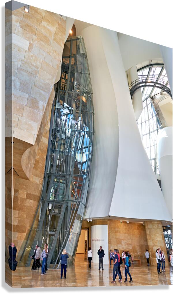 Visitors explore the interior of the Guggenheim Museum in Bilbao