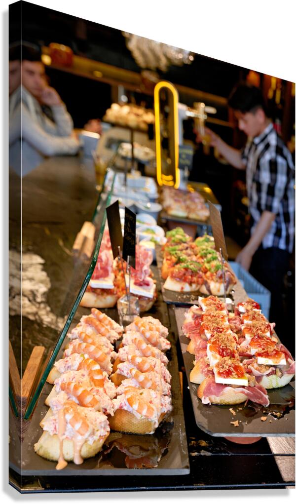 Enjoying classic pinchos in Bilbao Spain at local bar