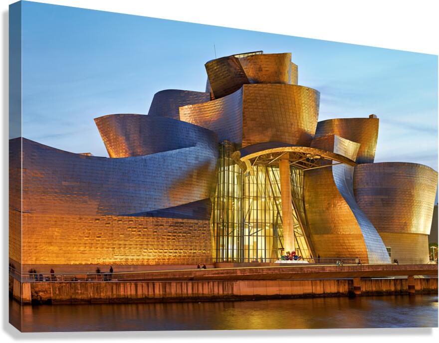 Guggenheim Museum at dusk in Bilbao Spain with lights on