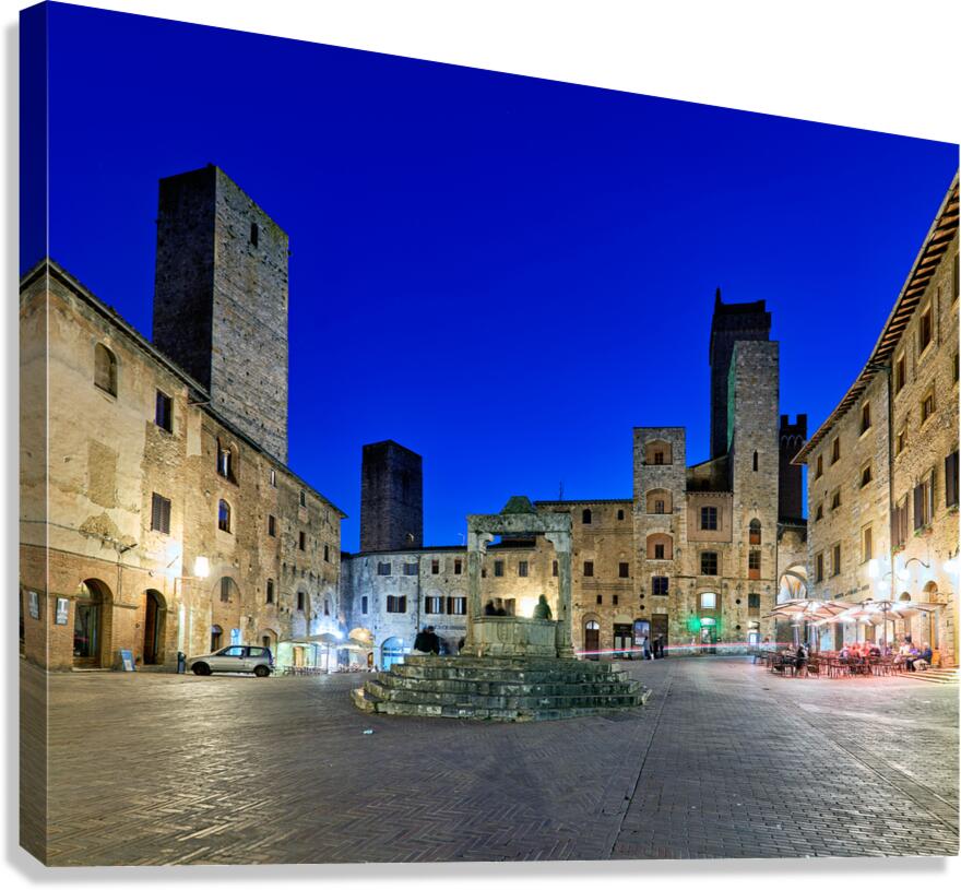 Sunset view of Piazza della Cisterna in San Gimignano Italy