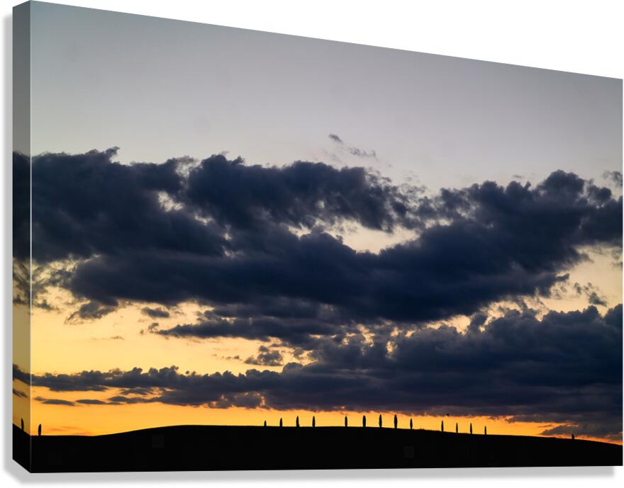 Sunset in Val dOrcia with cypresses in the background