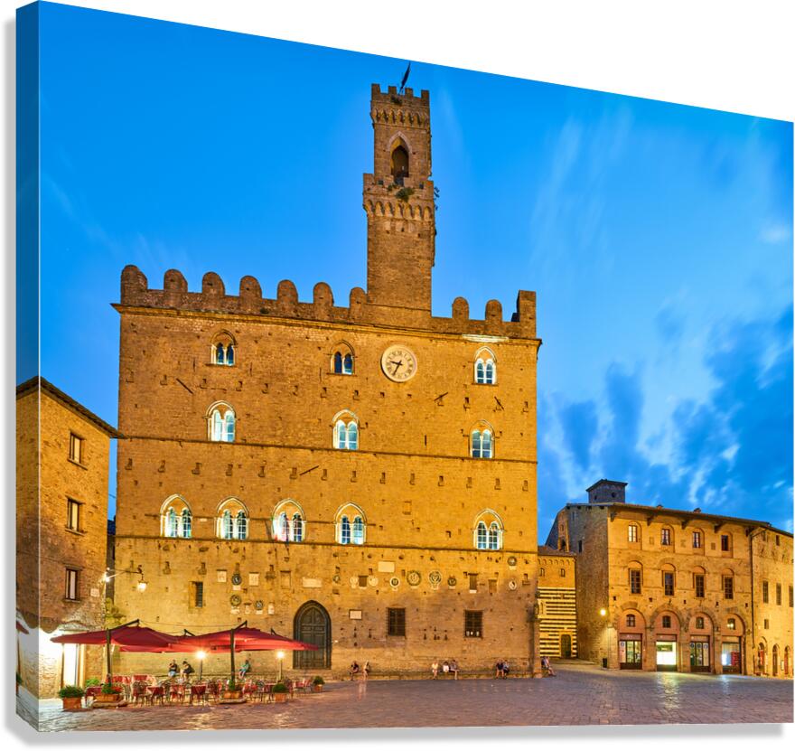 Visit Palazzo dei Priori in Volterra Tuscany during twilight