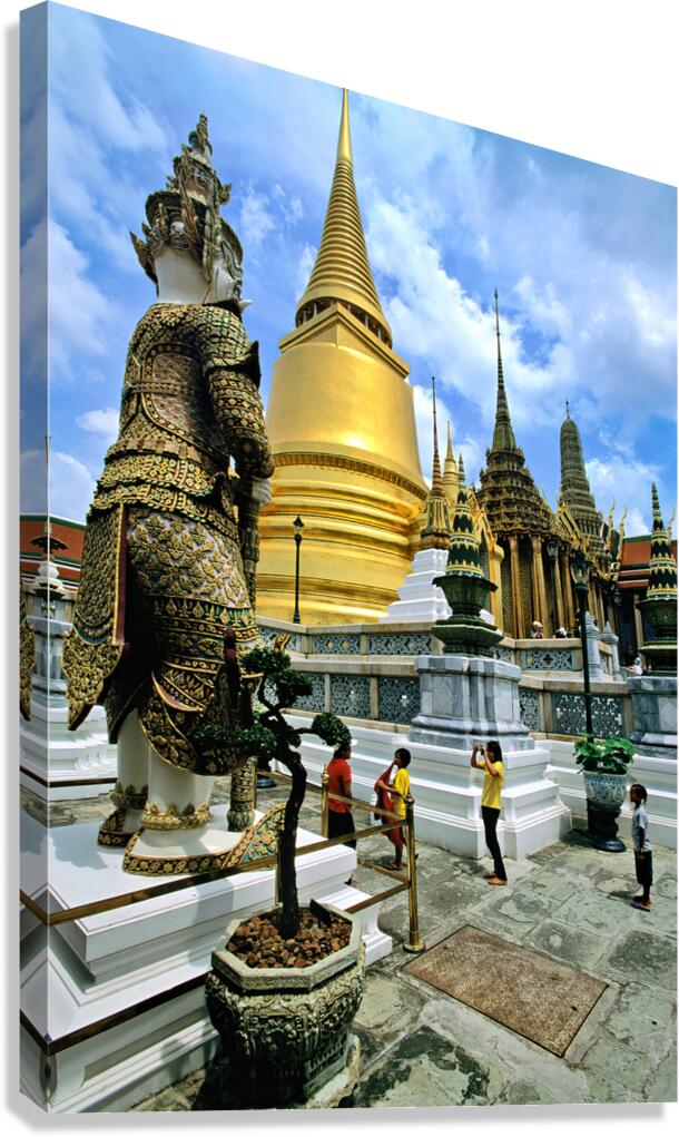 Wat Phra Kaew in Bangkok with visitors exploring the site