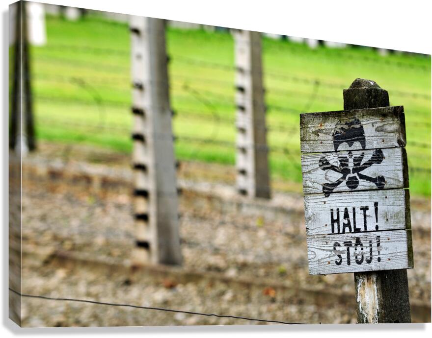 Sign marking danger at Auschwitz concentration camp in Krakow
